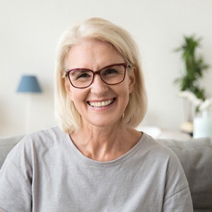 Woman with dentures smiling