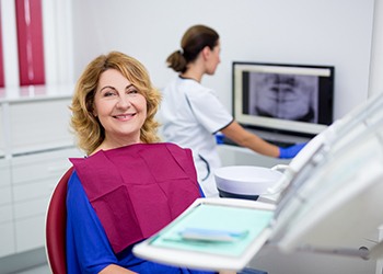 Woman smiling in the dental chair during appointment 
