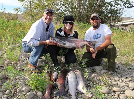 Dr. Harder and family with fish