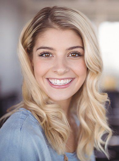 young blonde woman smiling