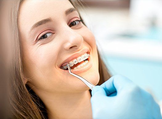 girl with traditional braces