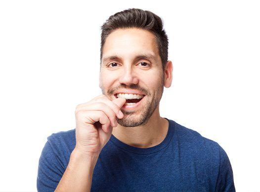 man putting invisalign