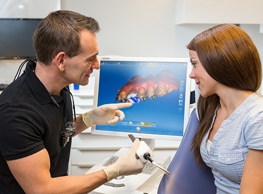 dentist using digital impression system