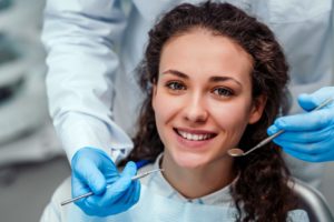 young woman attending checkup with dentist in Moses Lake