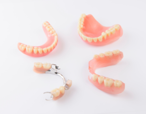 an assortment of partial dentures and bridges